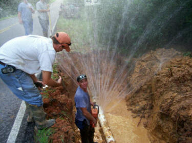 Harrisburg Water Authoritys maintenance crews make repairs on the 6 inch PVC water main. 